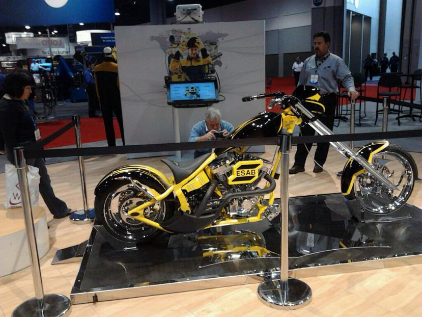 ESAB logo and motorcycle