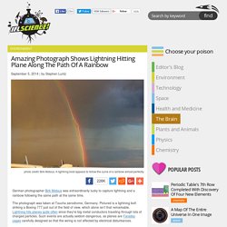 Amazing Photograph Shows Lightning Hitting Plane Along The Path Of A Rainbow
