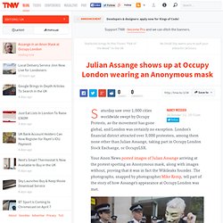 Julian Assange shows up at Occupy London wearing an Anonymous mask