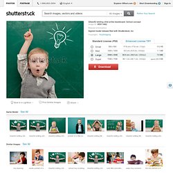 Cheerful Smiling Child At The Blackboard. School Concept Foto Stock: 95571682