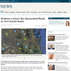 Brisbane workers flee Queensland floods as river breaks banks
