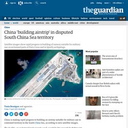 China 'building airstrip' in disputed South China Sea territory