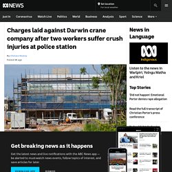 Charges laid against Darwin crane company after two workers suffer crush injuries at police station