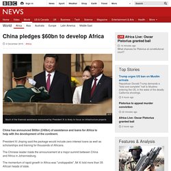 China pledges $60bn to develop Africa