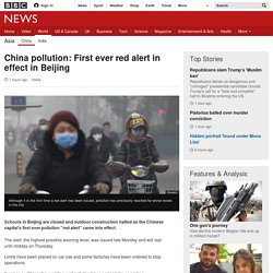 China pollution: Beijing issues first red smog alert