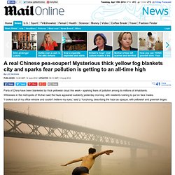 A real Chinese pea souper! Cities shrouded in thick yellow fog spark fears pollution is getting to an all-time high
