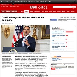 Credit downgrade mounts pressure on debt panel