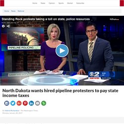 North Dakota wants hired pipeline protesters to pay state income taxes