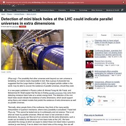 Detection of mini black holes at the LHC could indicate parallel universes in extra dimensions