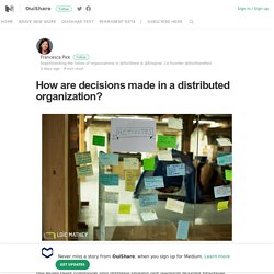How are decisions made in a distributed organization?