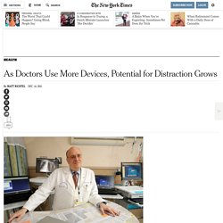 As Doctors Use More Devices, Potential for Distraction Grows
