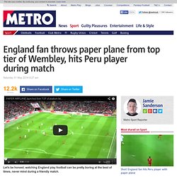 England national football team: England fan throws paper plane from top of We...