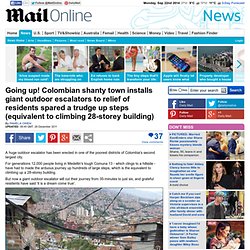 Going up! Colombian shanty town installs giant outdoor escalators to relief of residents spared a trudge up steps (equivalent to climbing 28-storey building)