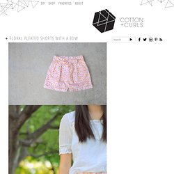 Floral pleated shorts with a bow