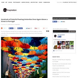 Hundreds of Colorful Floating Umbrellas Once Again Above a Street in Portugal