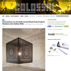 Intersections: An Ornately Carved Wood Cube Projects Shadows onto Gallery Walls