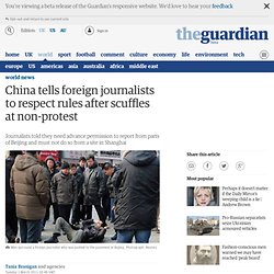 China tells foreign journalists to respect rules after scuffles at non-protest