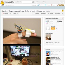 Maestro - finger mounted input device to control the cursor.