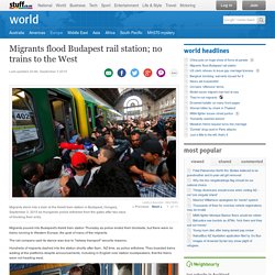 Migrants flood Budapest rail station; no trains to the West