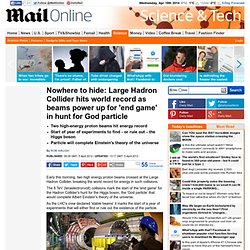 Nowhere to hide: Large Hadron Collider hits world record as beams are switched on for 'endgame' in hunt for Higgs