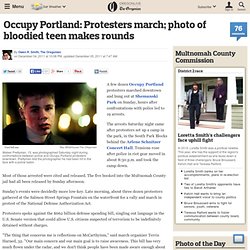 Occupy Portland: Protesters march; photo of bloodied teen makes rounds