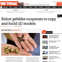 Robot pebbles cooperate to copy and build 3D models