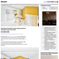 Raúl Sánchez Architects creates golden cubes inside duplex apartment
