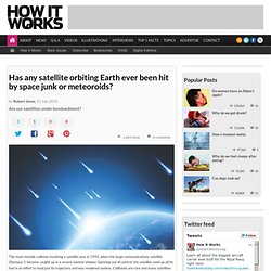 Has any satellite orbiting Earth ever been hit by space junk or meteoroids?