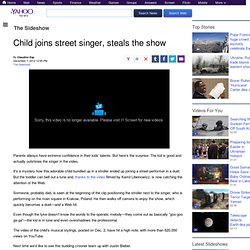 Child joins street singer, steals the show