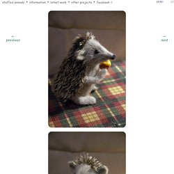 Stuffed Animals by Natasha Fadeeva - hedgehog holding an apple
