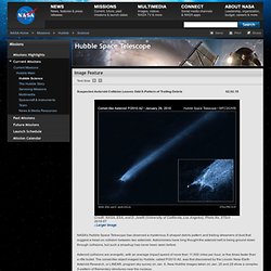 Suspected Asteroid Collision Leaves Odd X-Pattern of Trailing Debris