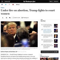 Under fire on abortion, Trump fights to court women